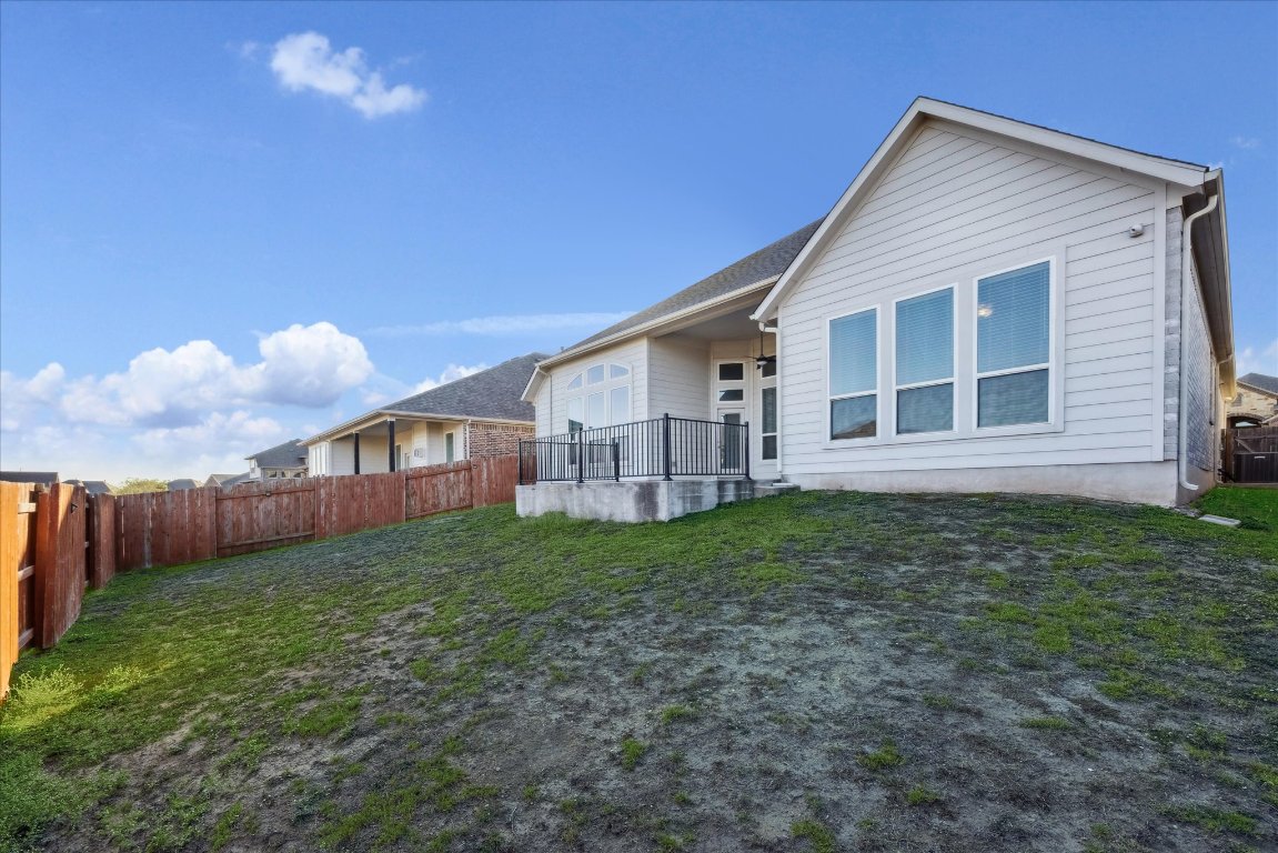 623 Baretta Loop Buda, TX 78610 - Photo 10 of 10 a view of a house with a yard