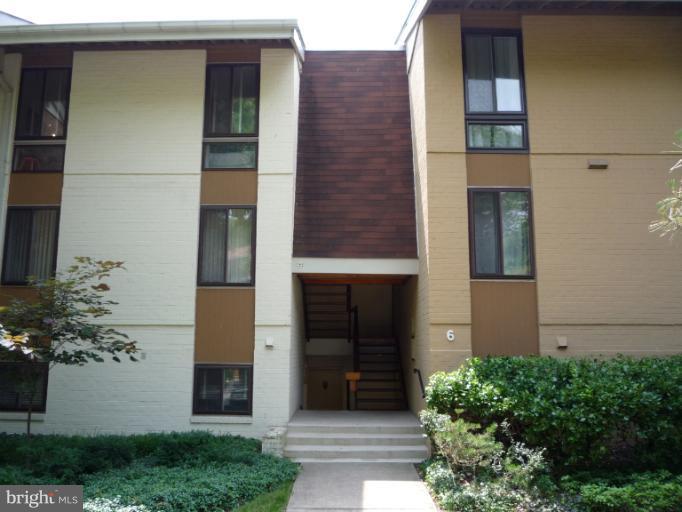 6 Cross Keys Road, Unit 6A Baltimore, MD 21210 - Photo 1 of 30 a front view of a house with a garage