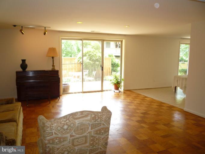6 Cross Keys Road, Unit 6A Baltimore, MD 21210 - Photo 2 of 30 a living room with furniture and a flat screen tv