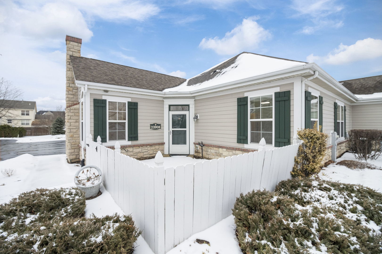 23908 Dayfield Drive, Unit 23908 Plainfield, IL 60586 - Photo 2 of 23 a front view of a house with a patio