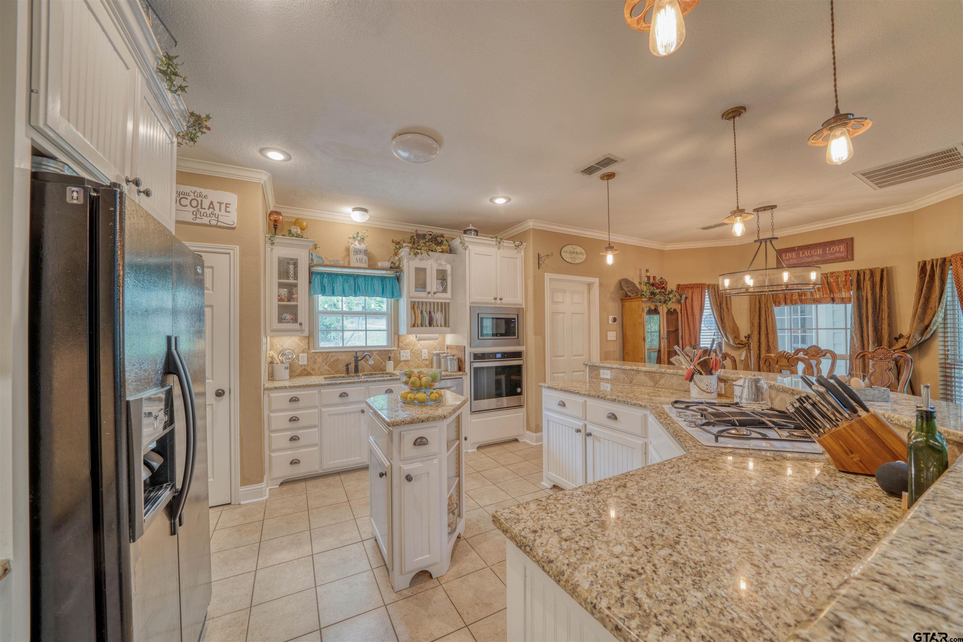 1776 Mustang Road Gilmer, TX 75645 - Photo 18 of 45 a large kitchen with lots of counter space