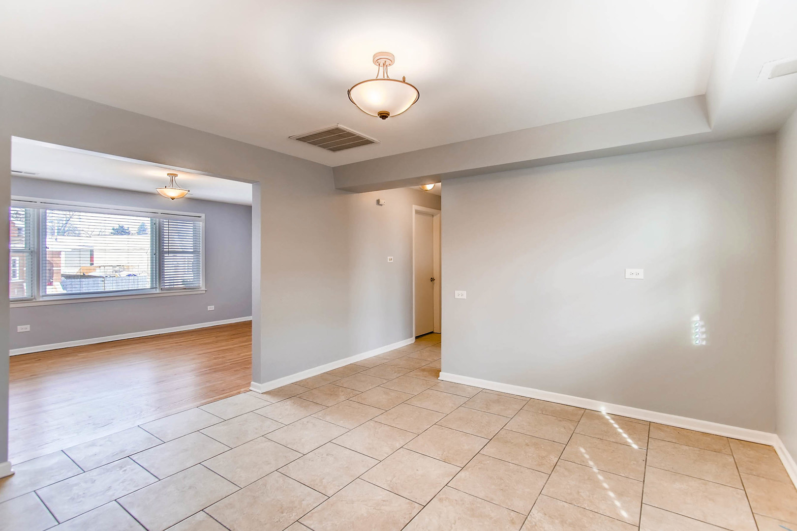 7233 38th Place Lyons, IL 60534 - Photo 17 of 26 a view of an empty room and window