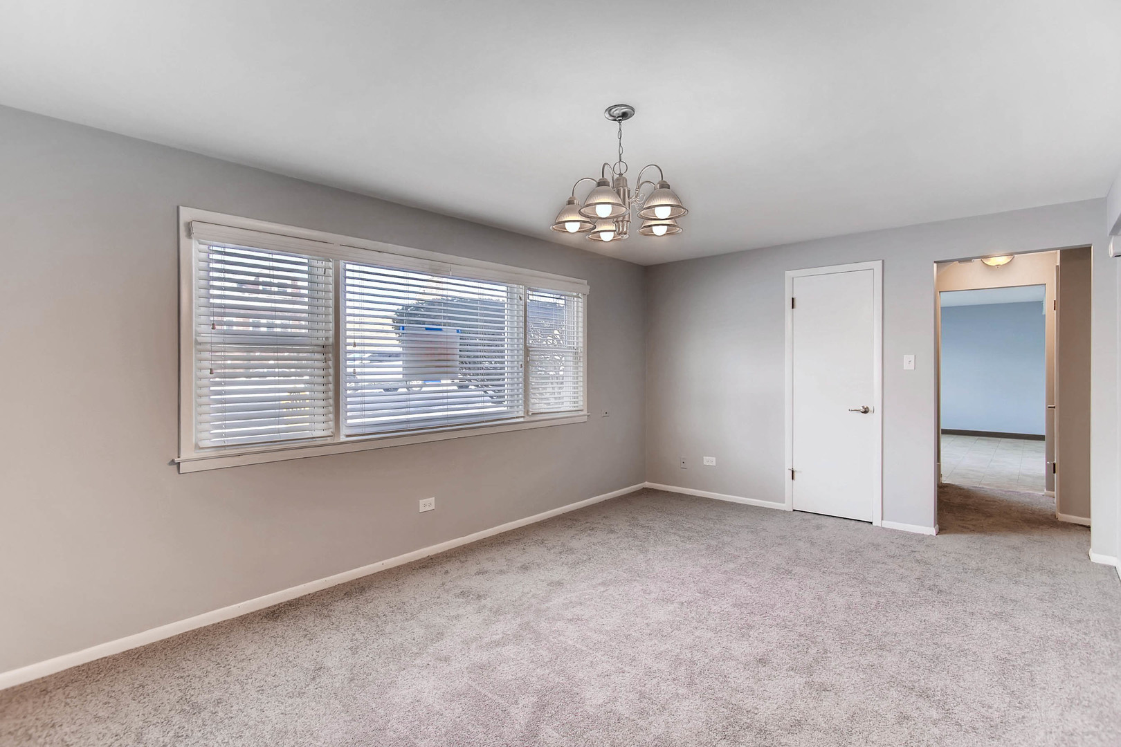 7233 38th Place Lyons, IL 60534 - Photo 5 of 26 a view of an empty room with a window