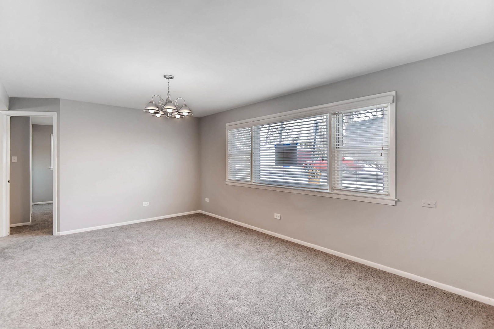 7233 38th Place Lyons, IL 60534 - Photo 6 of 26 a view of an empty room with a window
