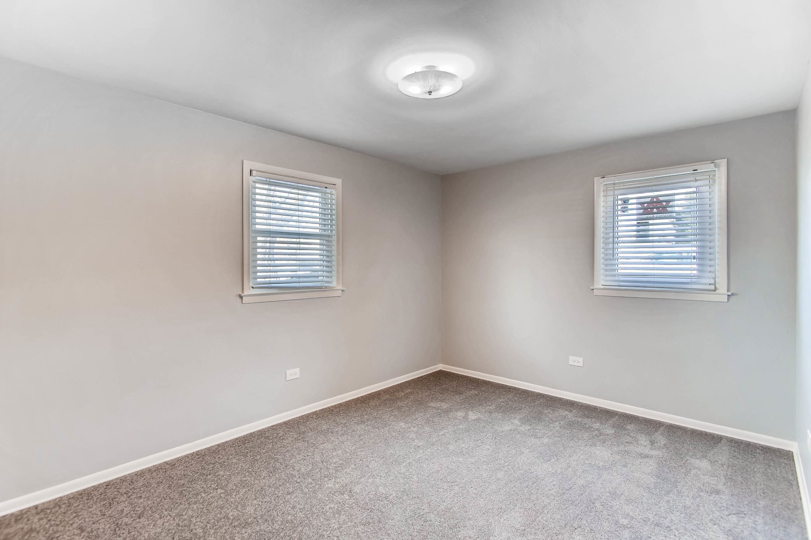 7233 38th Place Lyons, IL 60534 - Photo 8 of 26 an empty room with a window