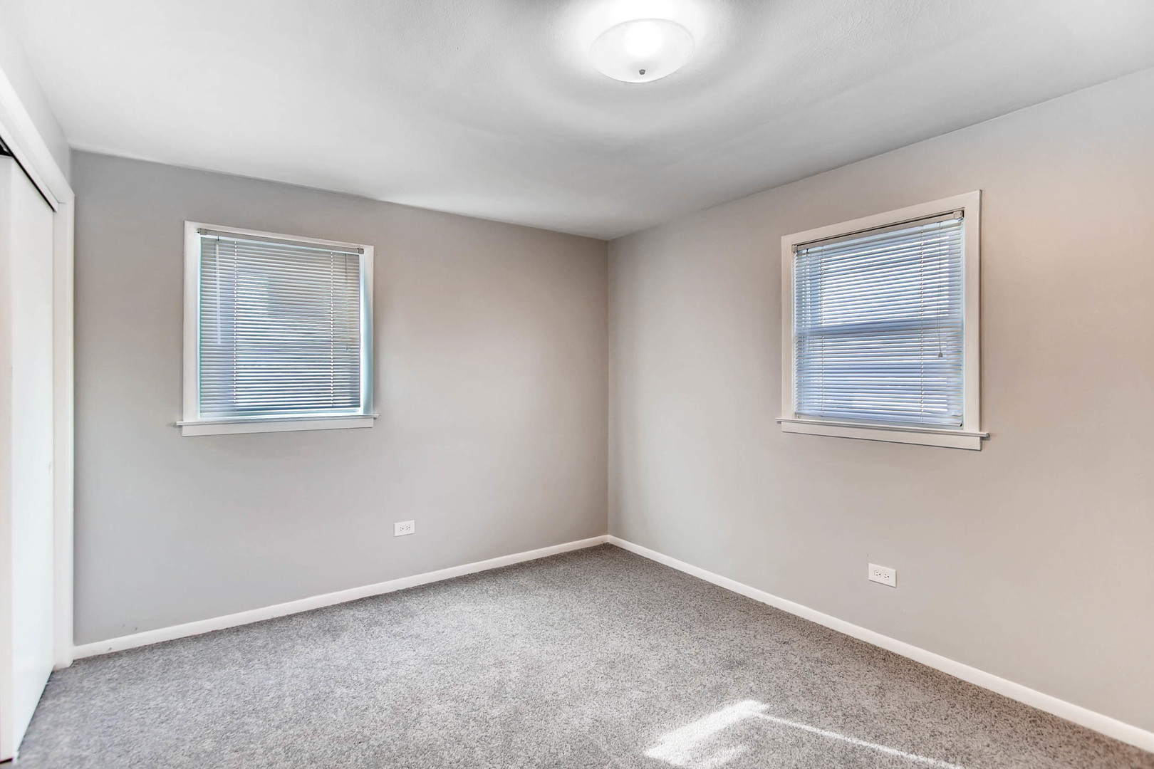 7233 38th Place Lyons, IL 60534 - Photo 9 of 26 an empty room with windows