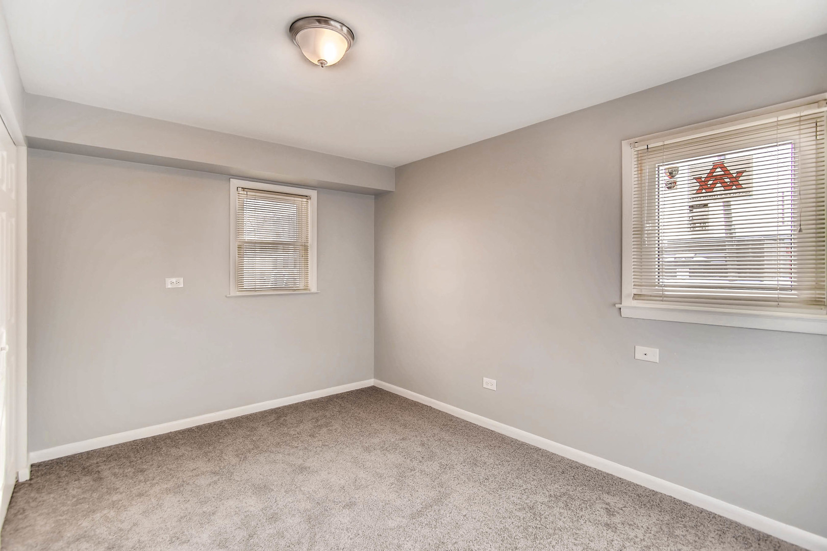 7233 38th Place Lyons, IL 60534 - Photo 10 of 26 an empty room with windows