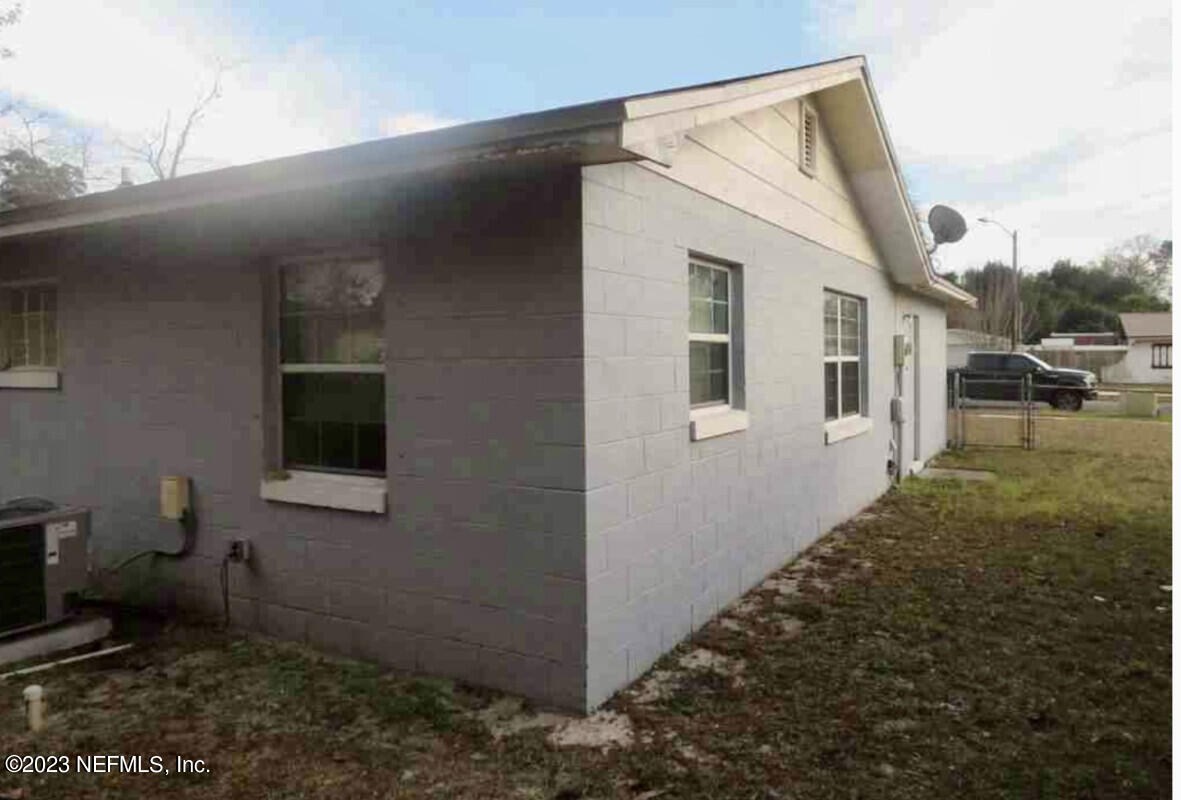 8345 Chessman Court Jacksonville, FL 32244 - Photo 3 of 6 a view of a house with backyard and sitting area