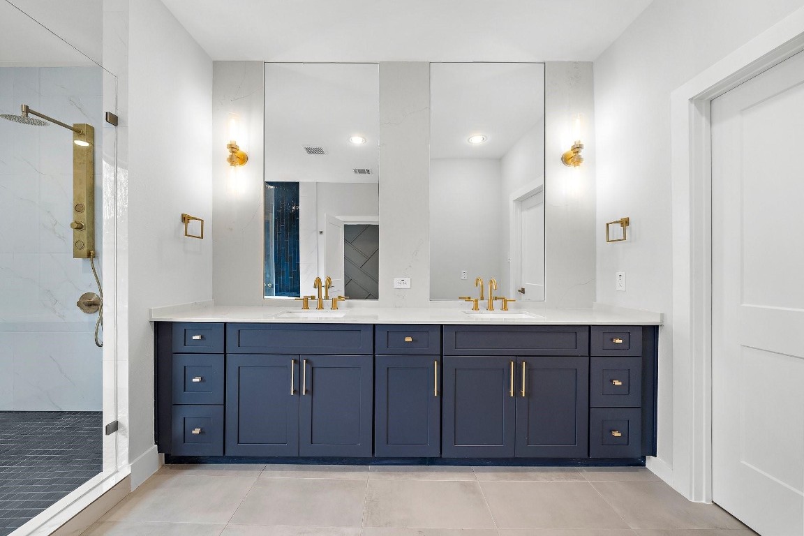 2200 Marnel Road, Unit I Houston, TX 77055 - Photo 11 of 25 a bathroom with a double vanity sink mirror and double