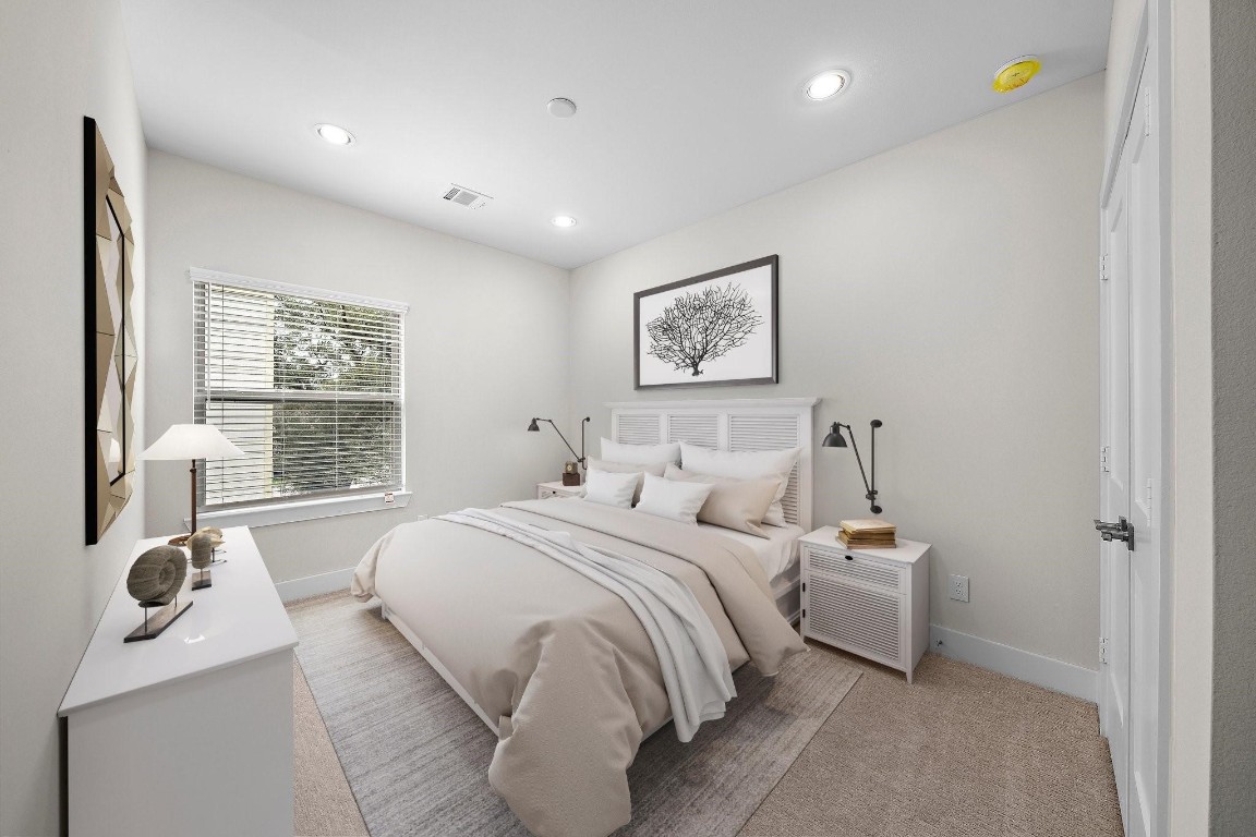 2200 Marnel Road, Unit I Houston, TX 77055 - Photo 18 of 25 a bedroom with a bed and a large window