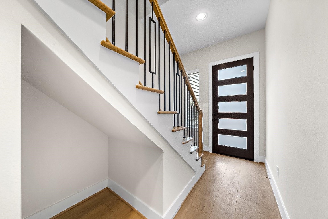 2200 Marnel Road, Unit I Houston, TX 77055 - Photo 4 of 25 a view of entryway and hall with wooden floor