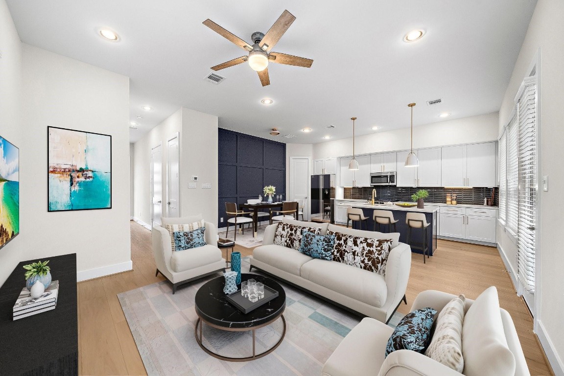 2200 Marnel Road, Unit I Houston, TX 77055 - Photo 6 of 25 a living room with furniture kitchen view and a fireplace