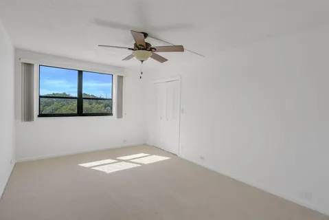 a view of empty room with windows