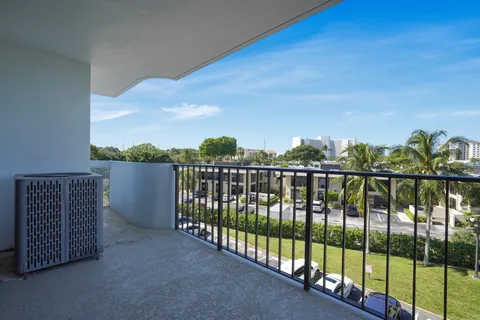 a view of balcony with furniture