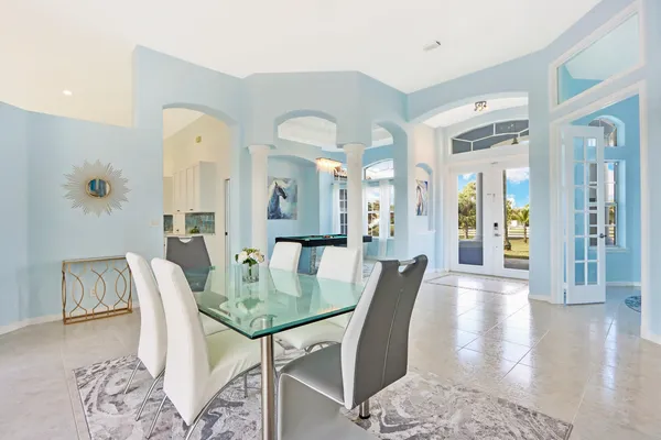 a view of a dining room with furniture