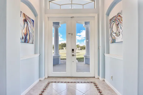 wooden floor with white walls