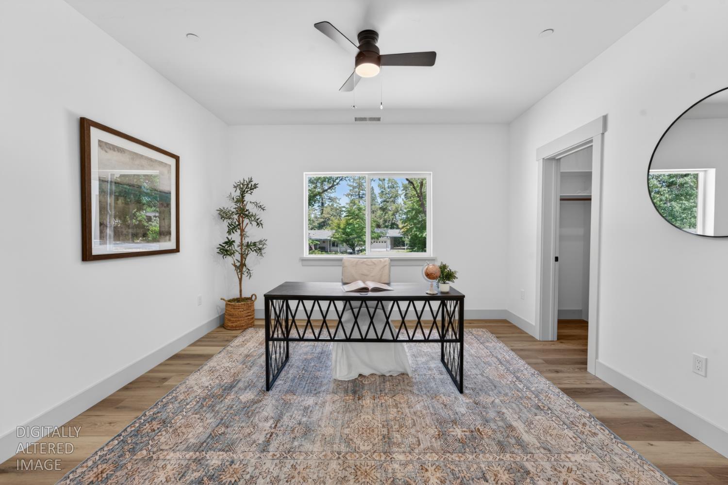 280 Jan Road Grass Valley, CA 95945 - Photo 14 of 66 a view of a hallway with wooden floor and a workspace