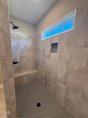 an empty room with a wooden door