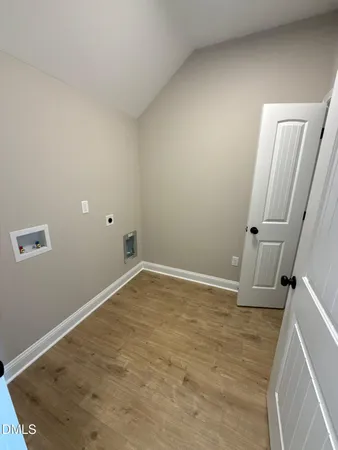 a bathroom with a granite countertop sink a mirror and a bathtub