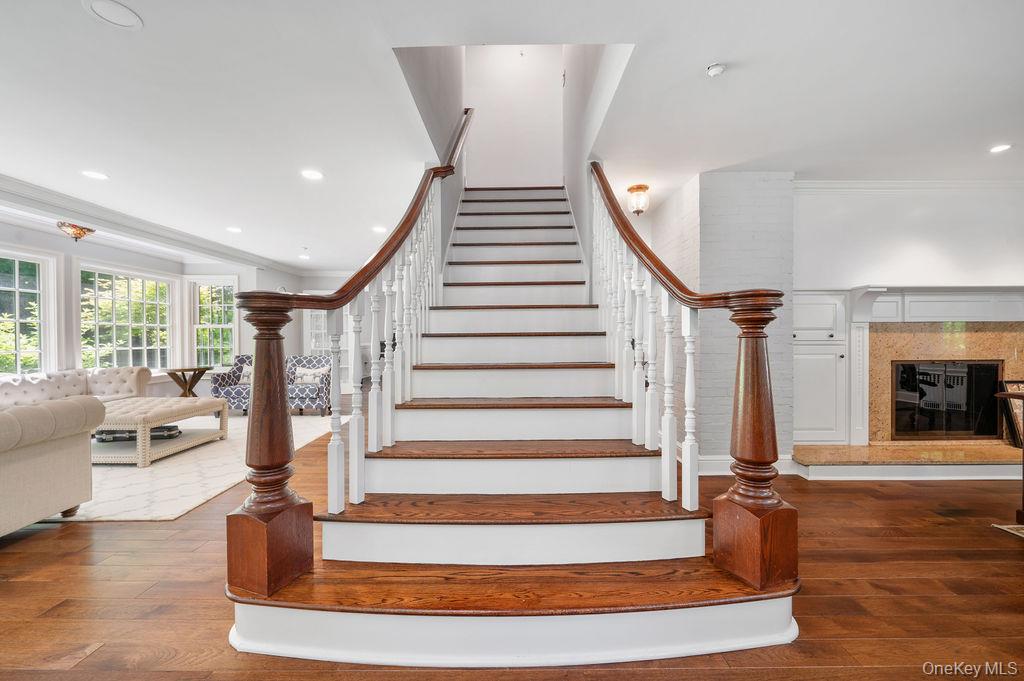 22 Crane Road Scarsdale, NY 10583 - Photo 32 of 32 Foyer with majestic staircase and a light filled open floor plan.