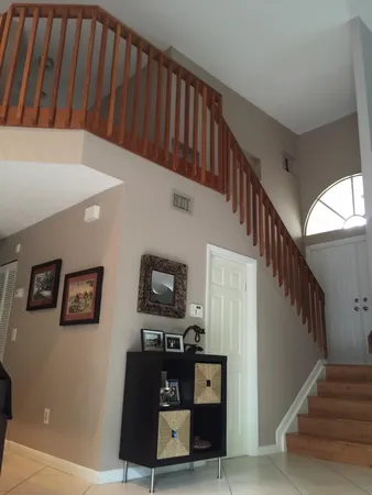 a view of entryway with wooden floor