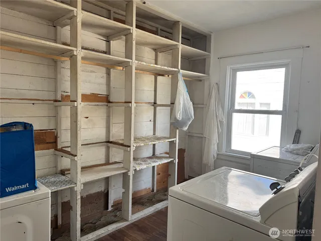 a storage room with washer and dryer