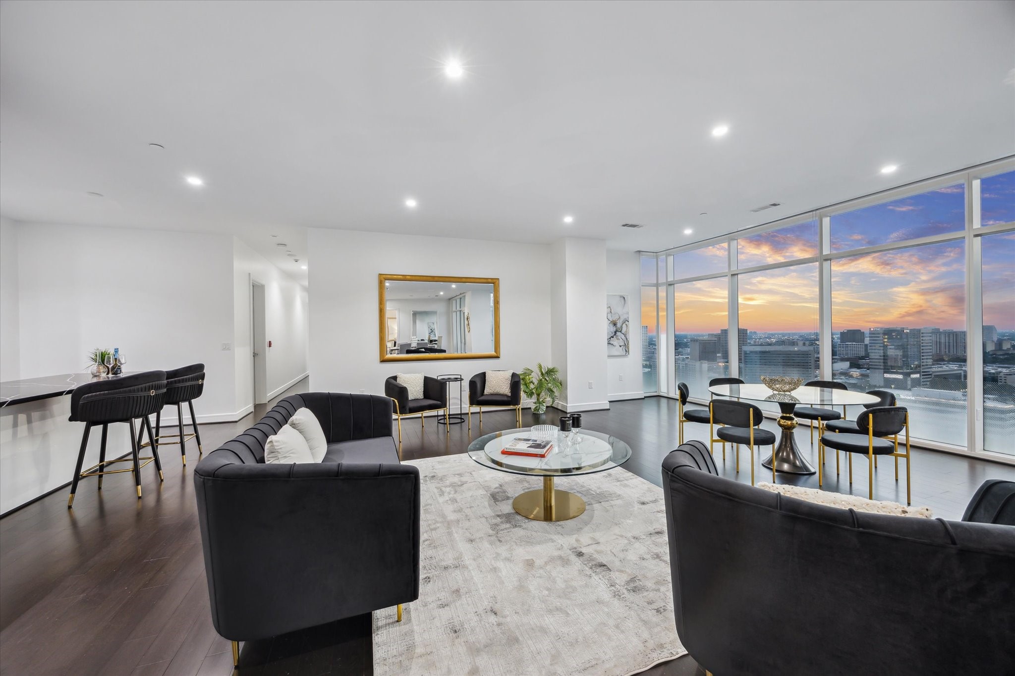 4521 San Felipe Street, Unit 23045 Houston, TX 77027 - Photo 1 of 25 a living room with fireplace furniture and a large window