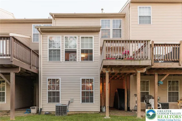 a front view of a house with outdoor space