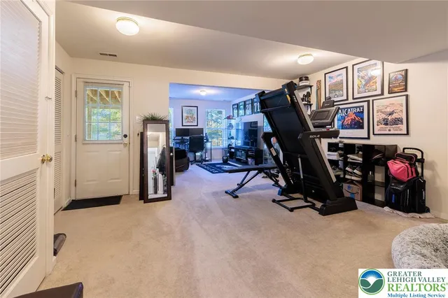 a view of a room with gym equipment