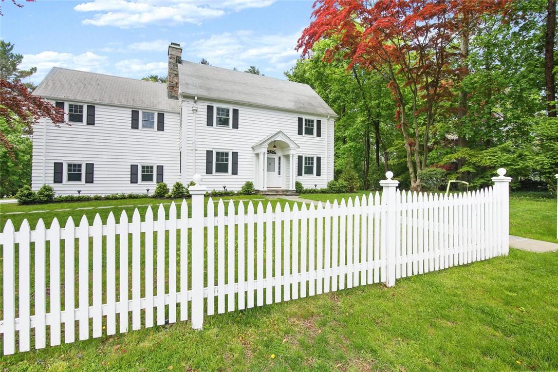 14 Ridge Drive Chappaqua, NY 10514 - Photo 1 of 1 a front view of a house with a garden