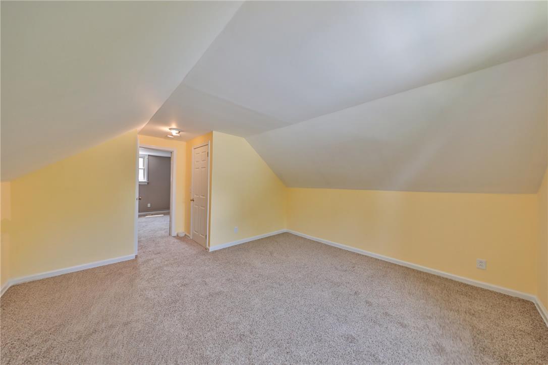 3050 Cornwall Road Bethlehem, PA 18017 - Photo 46 of 80 A spacious attic conversion offers versatile living with ample floor space and warm wall tones.