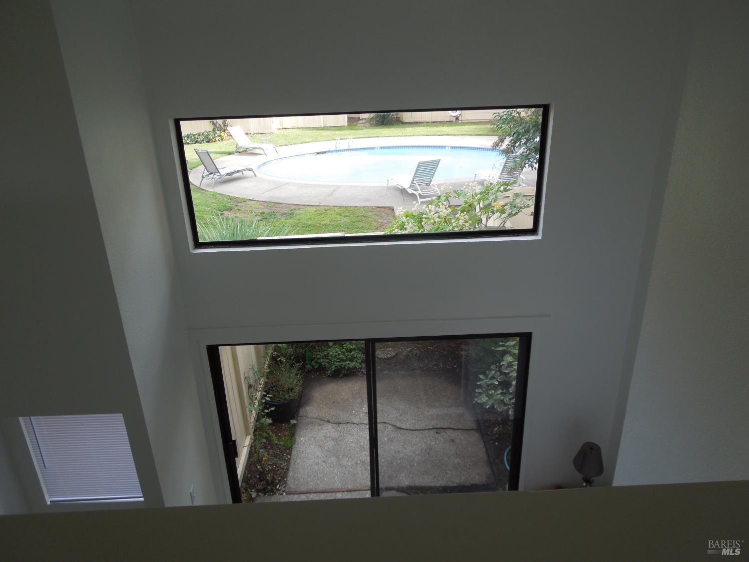 2802 Woodlake Drive Santa Rosa, CA 95405 - Photo 12 of 19 a view of wooden floor and a fireplace in a room