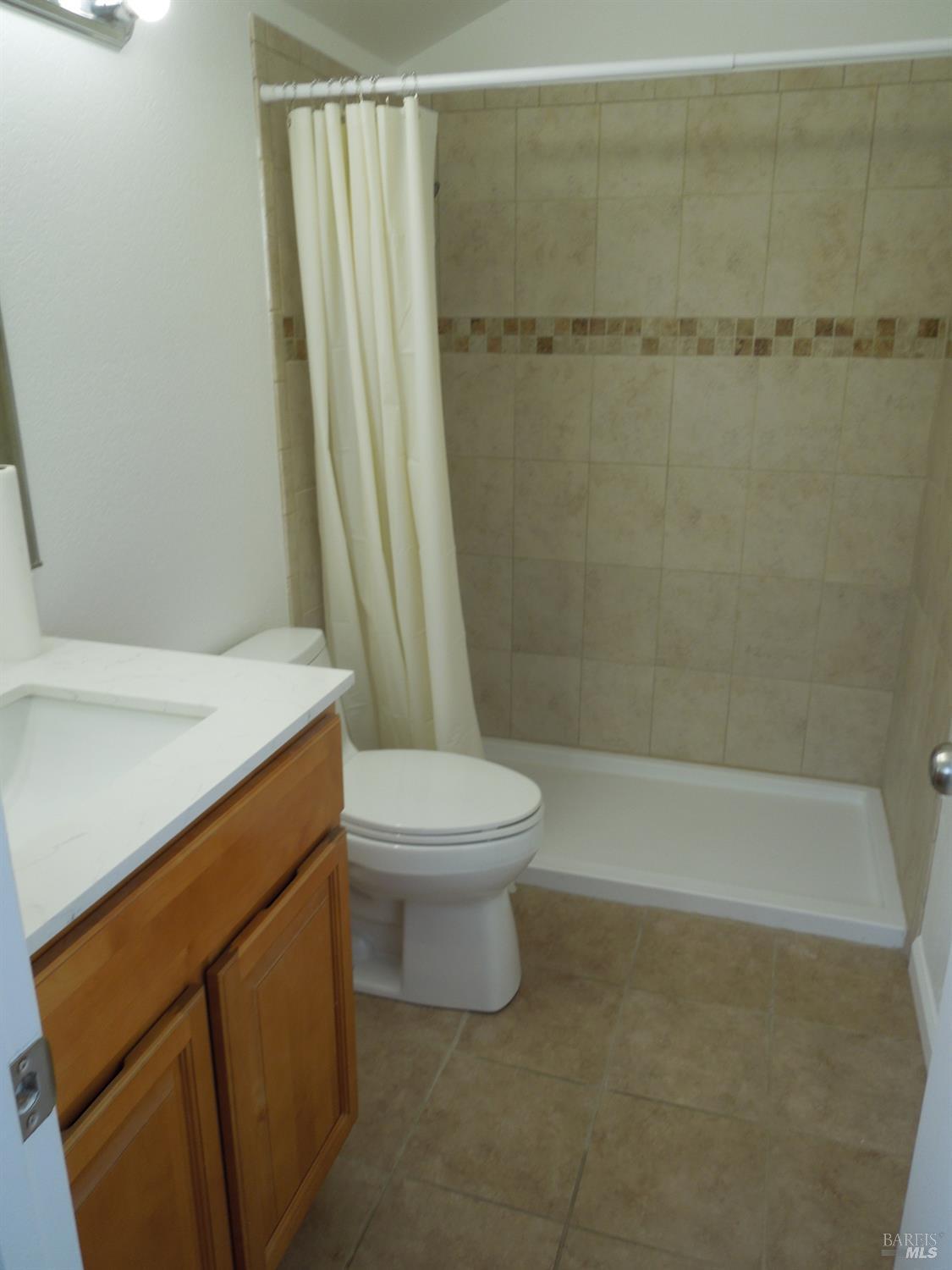 2802 Woodlake Drive Santa Rosa, CA 95405 - Photo 14 of 19 a bathroom with a toilet and a shower