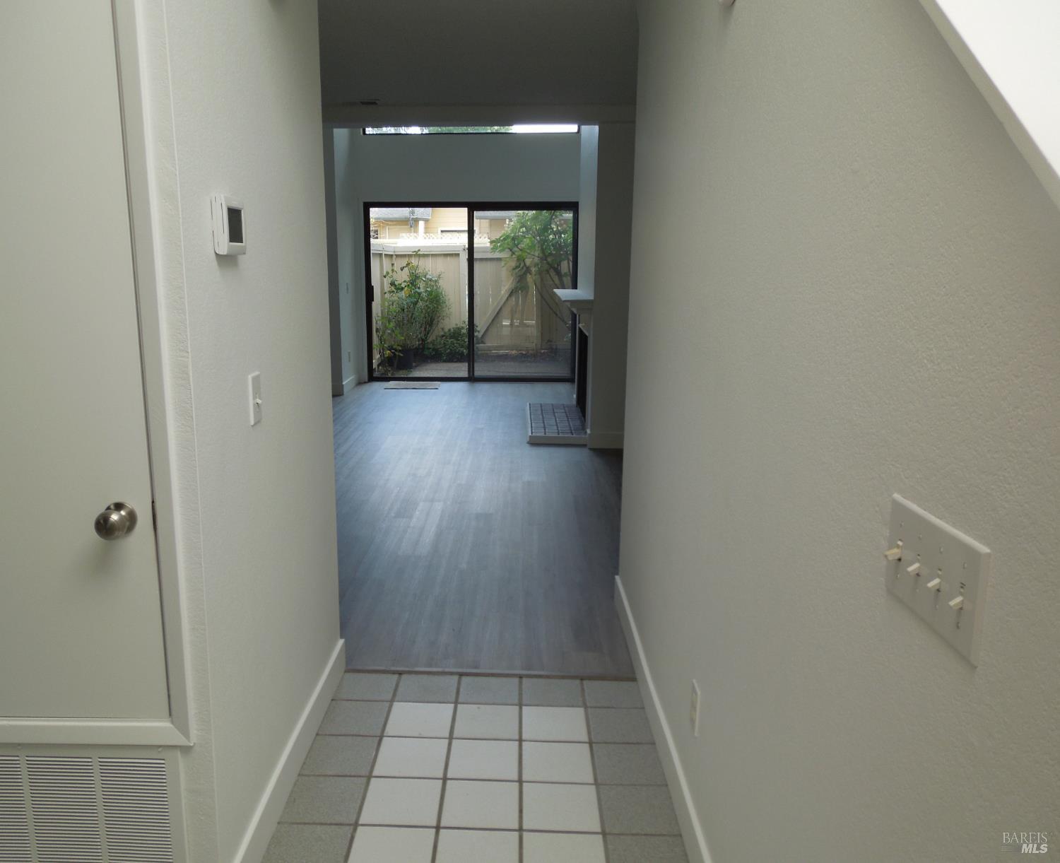 2802 Woodlake Drive Santa Rosa, CA 95405 - Photo 2 of 19 a bathroom with a sink and glass door