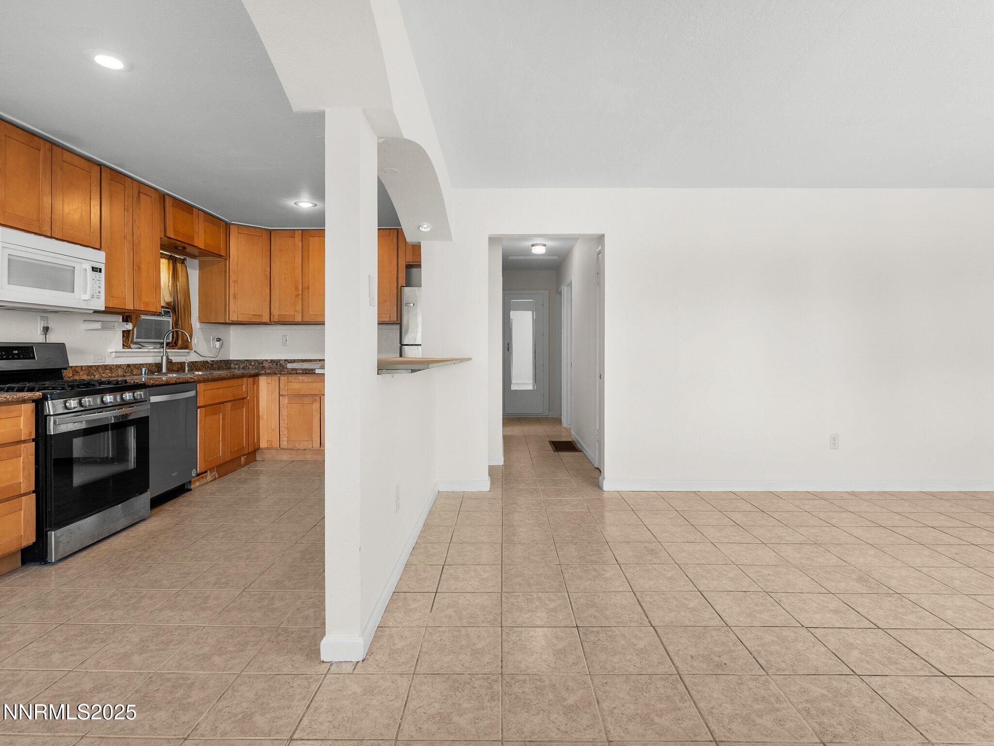 1955 Wilder Street Reno, NV 89512 - Photo 11 of 31 a view of a kitchen with a sink