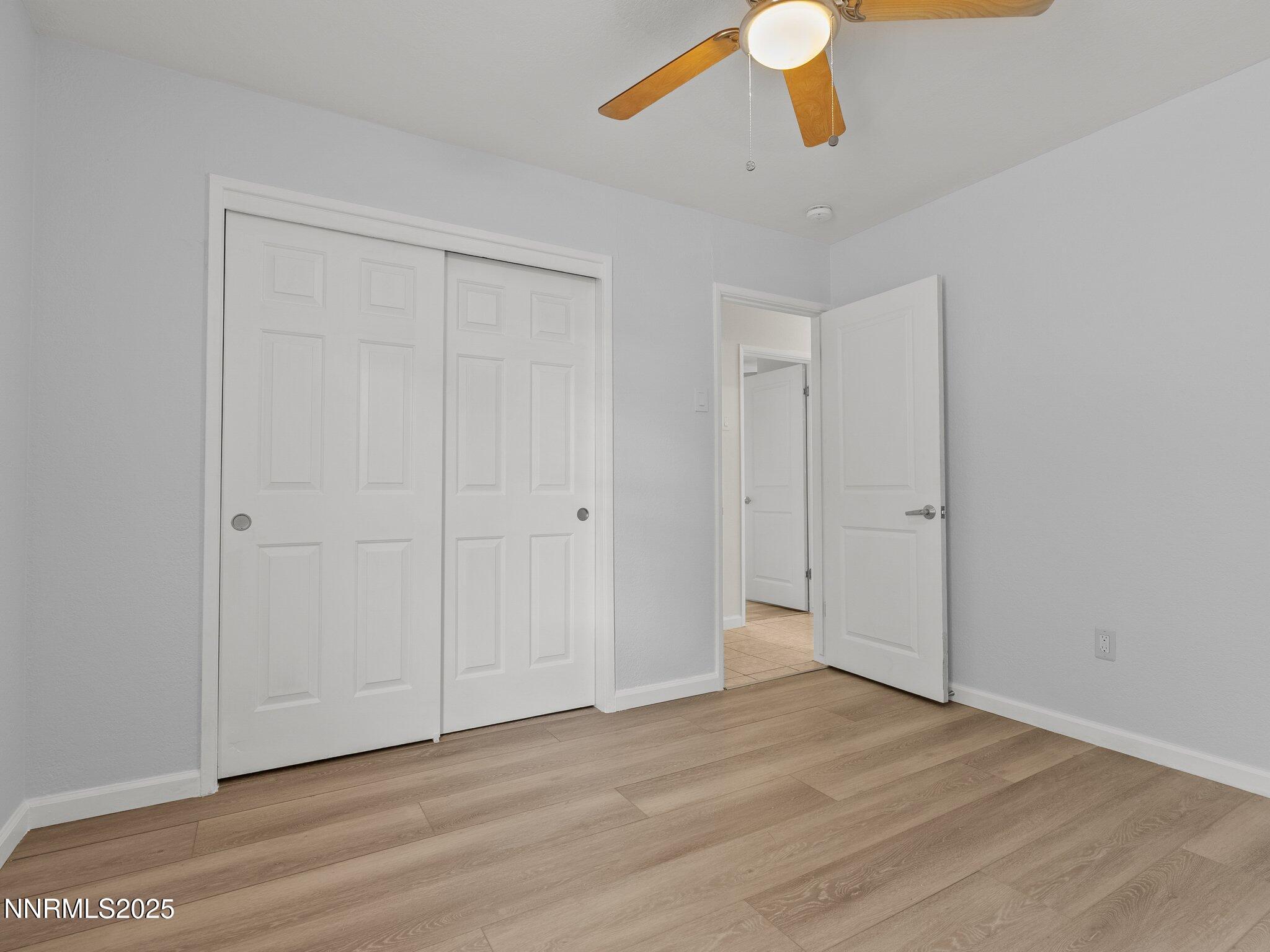 1955 Wilder Street Reno, NV 89512 - Photo 16 of 31 a view of empty room with wooden floor