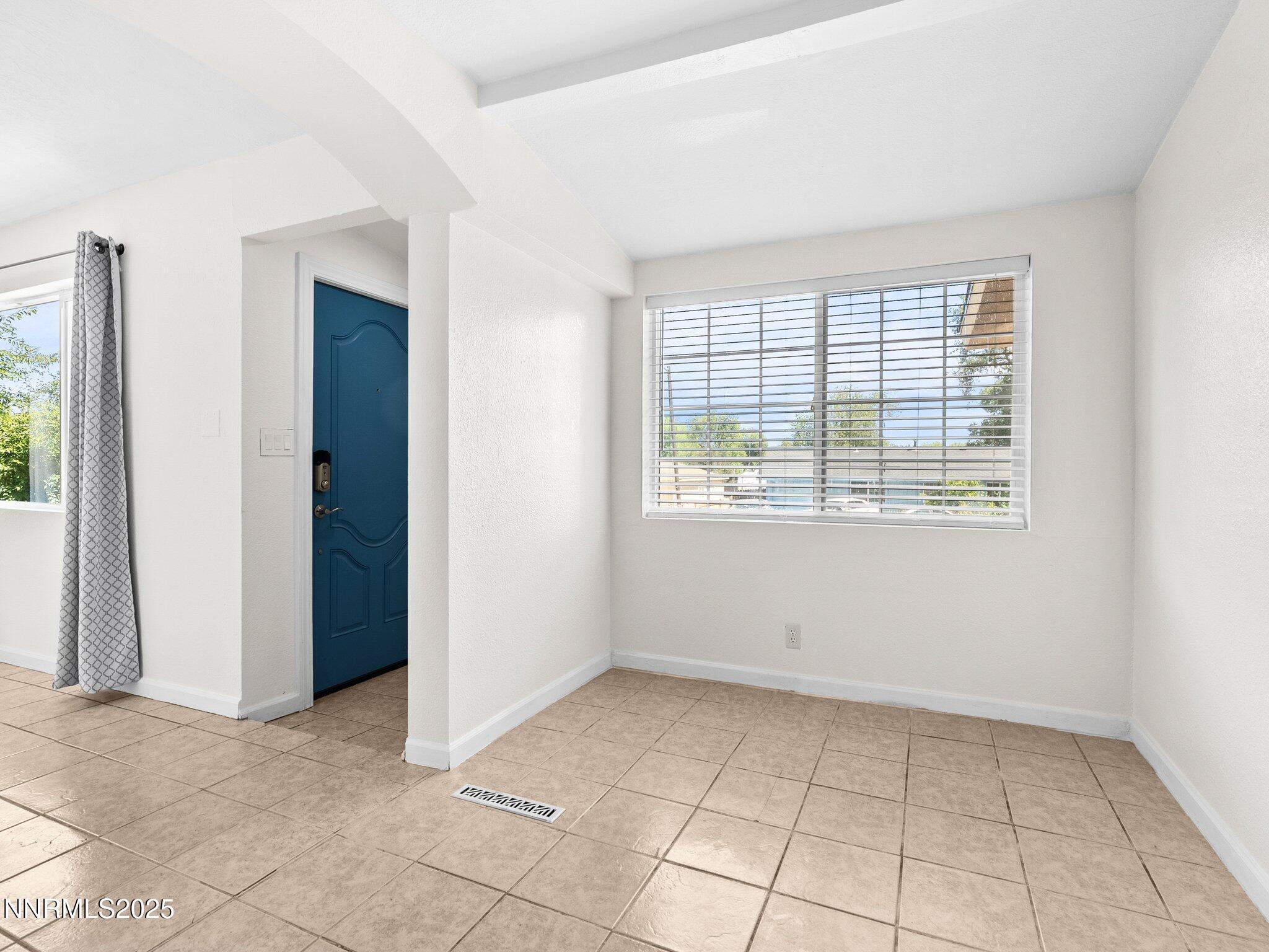 1955 Wilder Street Reno, NV 89512 - Photo 4 of 31 an empty room with windows