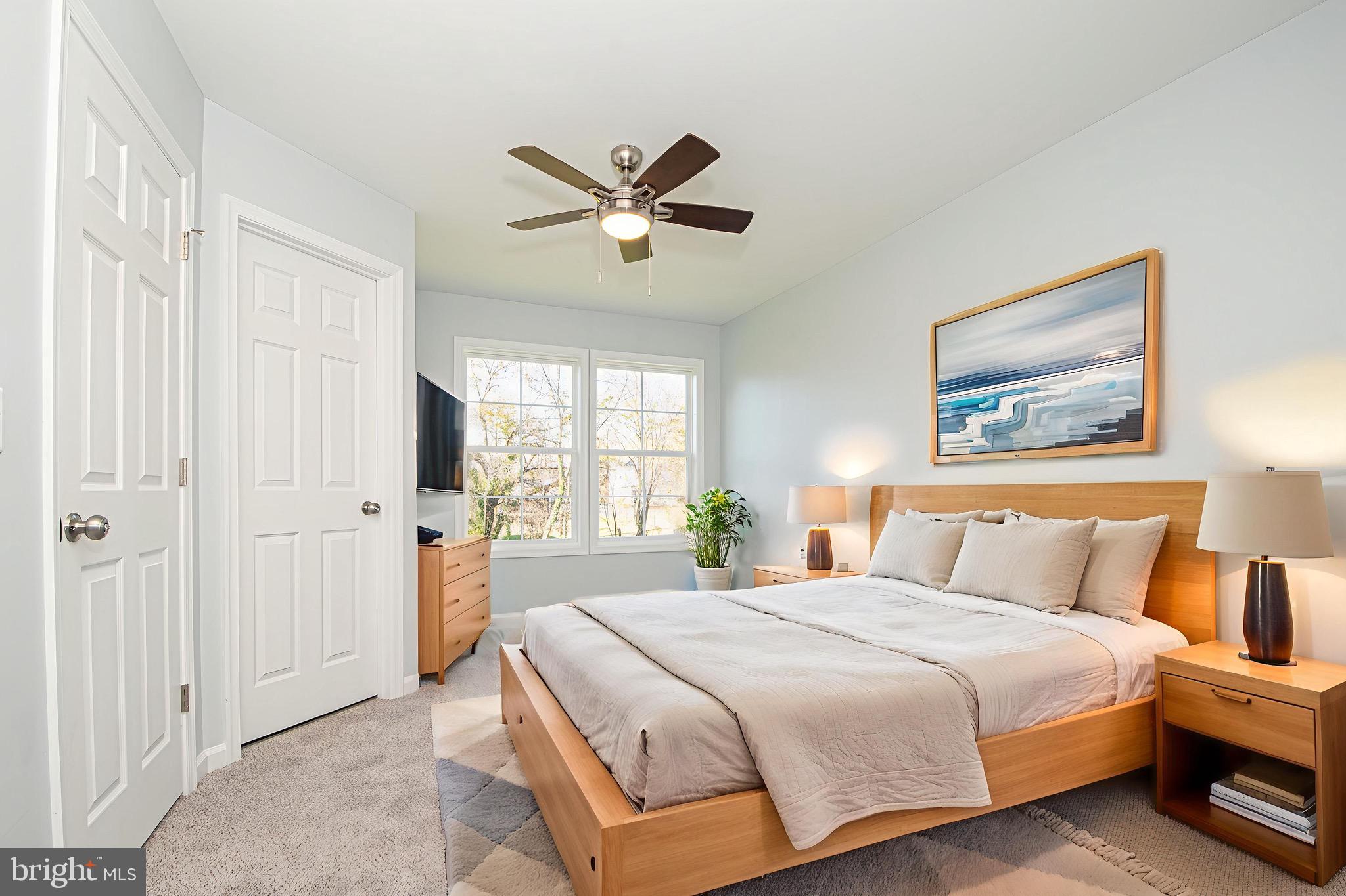 709 Ross Street Winchester, VA 22601 - Photo 39 of 40 a bedroom with a large bed and a window