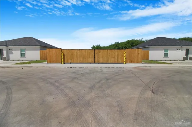 an aerial view of a house with a garden