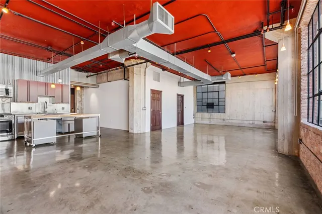 a view of a porch with a wooden fence