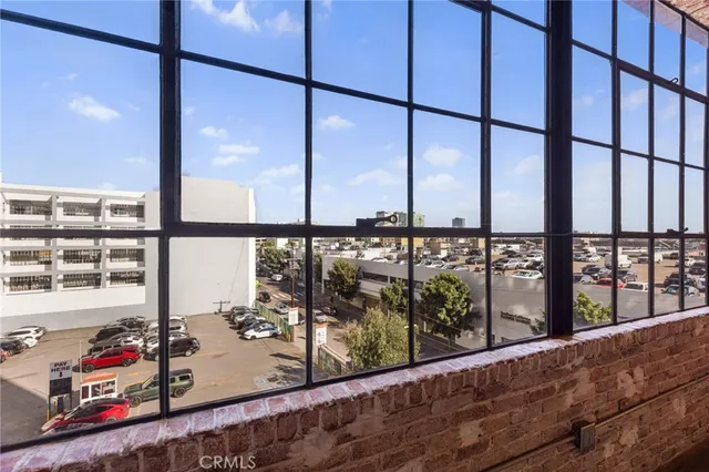 a bathroom with a bathtub sink and mirror