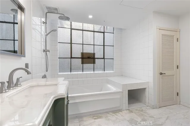 a utility room with washing machine