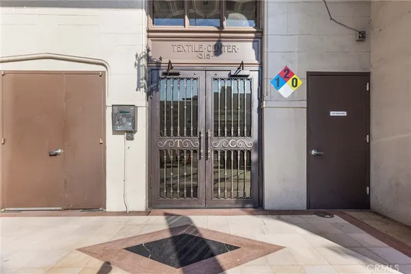 a view of an entryway with a door