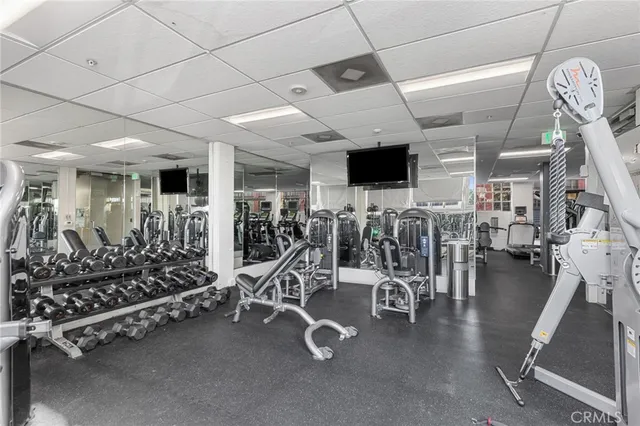 a swimming pool with outdoor seating and yard