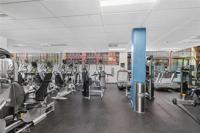 a view of swimming pool with outdoor seating and city view