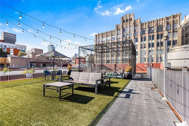 a city street with tall buildings