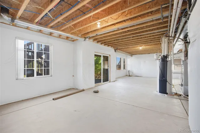 a view of an empty room with a windows
