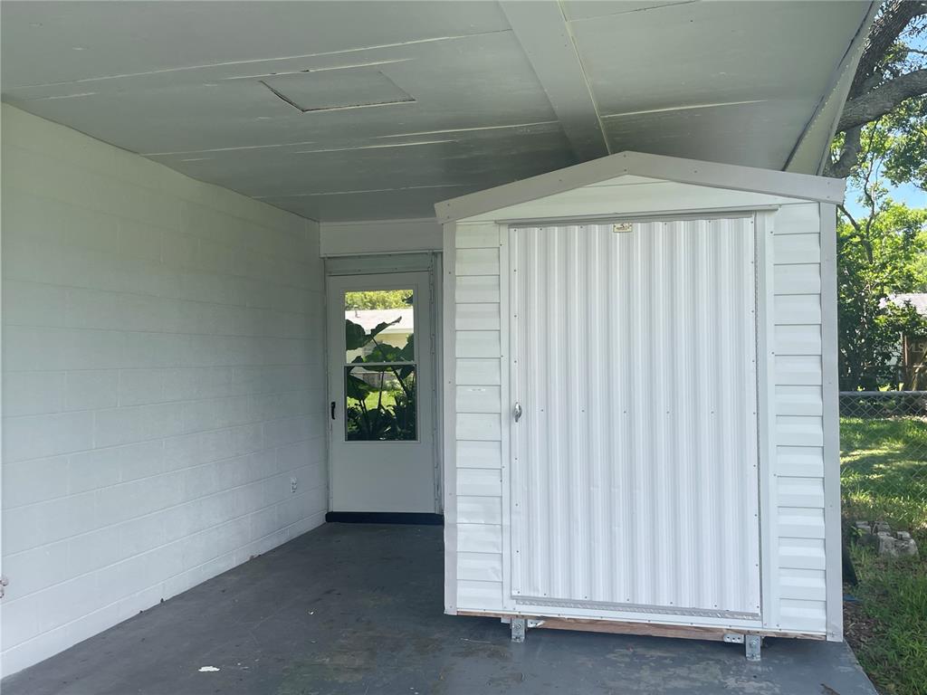 9244 Cyril Court Spring Hill, FL 34608 - Photo 30 of 30 a view of an empty room with a window