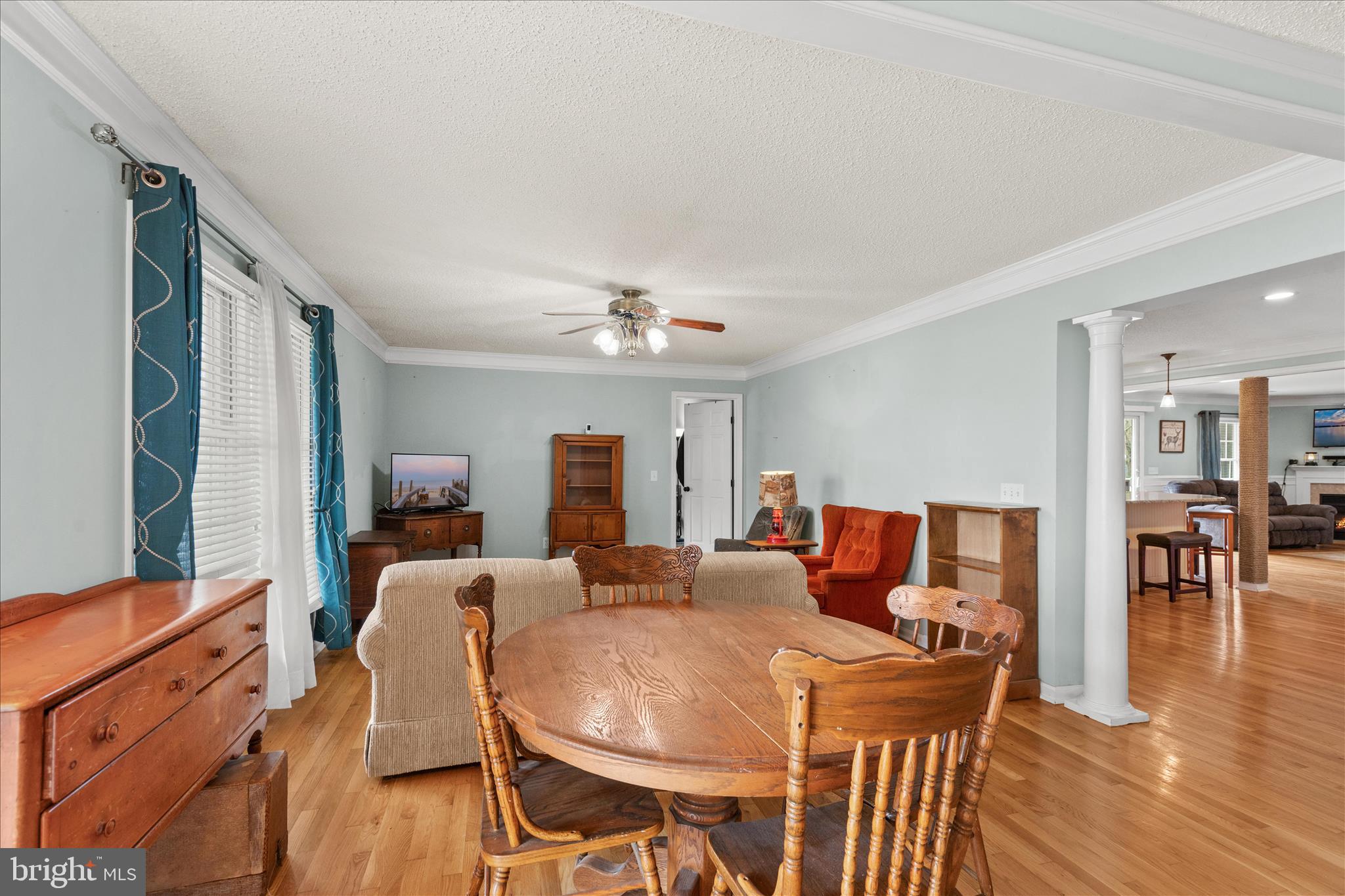 12647 Old Stage Road Bishopville, MD 21813 - Photo 66 of 84 a view of a dining room with furniture and wooden floor