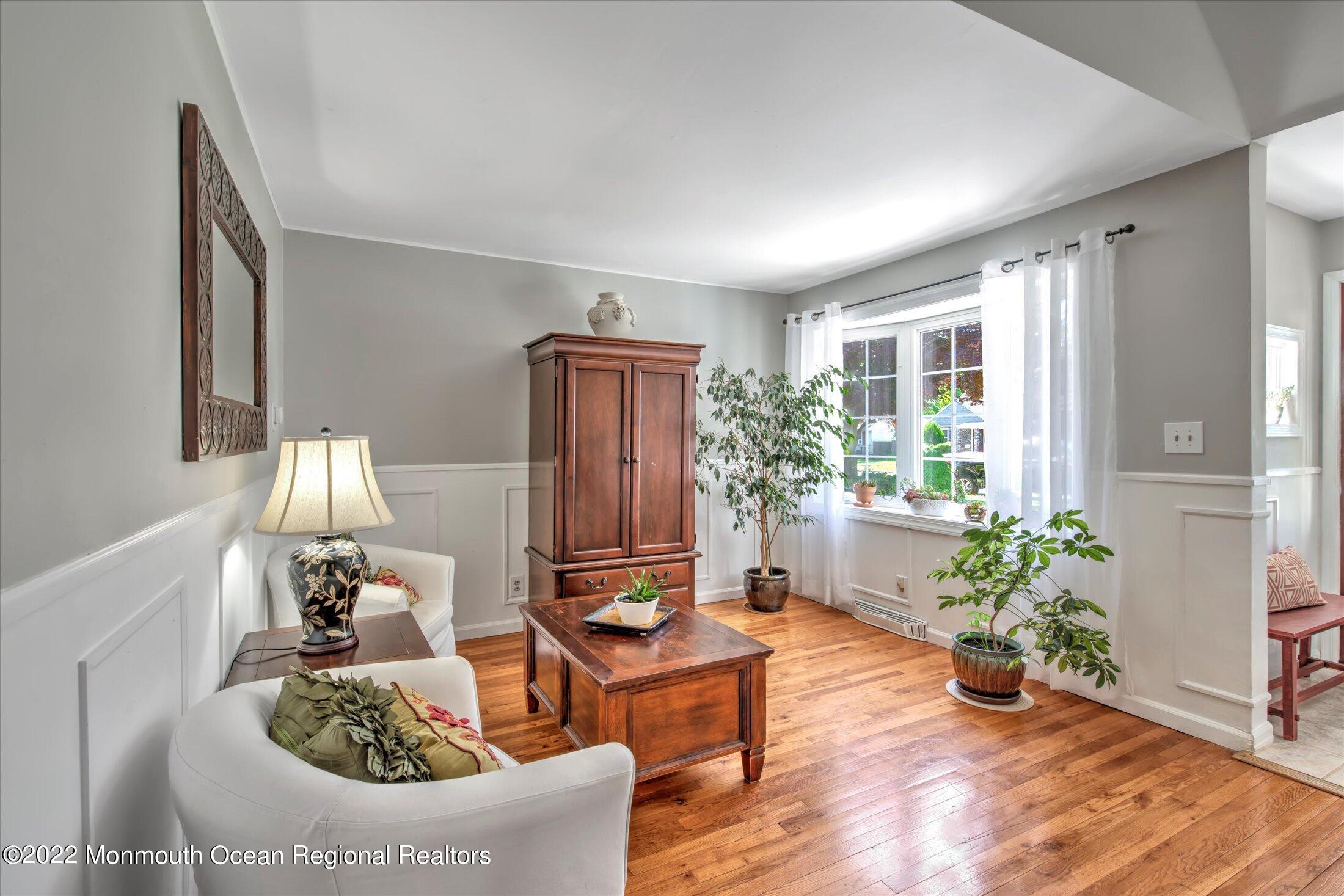 216 West Prospect Avenue Keyport, NJ 07735 - Photo 12 of 47 a living room with furniture and a potted plant